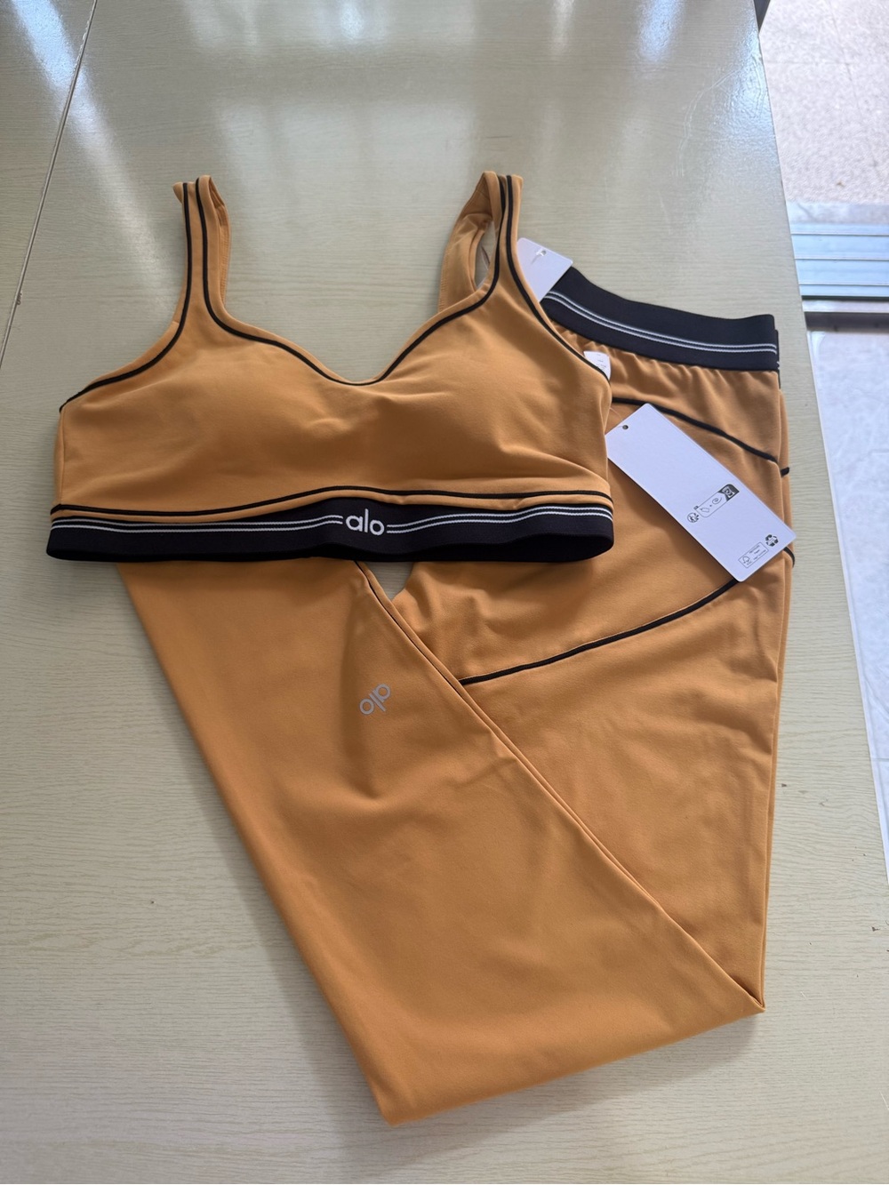 ALO Yoga Mustard Sports Bra with Black Trim - Picture 3 of 6